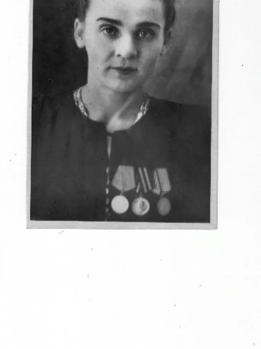 Л. Любиева